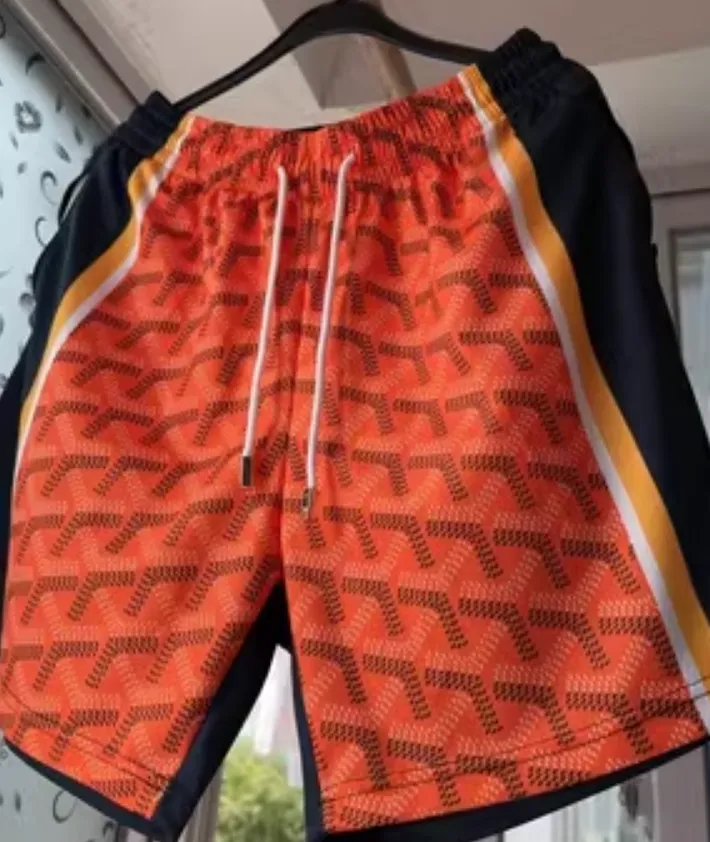 HOOPER FIKO CURRY WARRIORS BASKETBALL TRAINING SHORT IN ORANGE