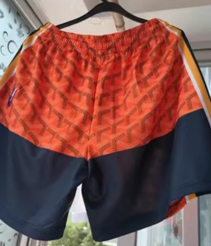 HOOPER FIKO CURRY WARRIORS BASKETBALL TRAINING SHORT IN ORANGE
